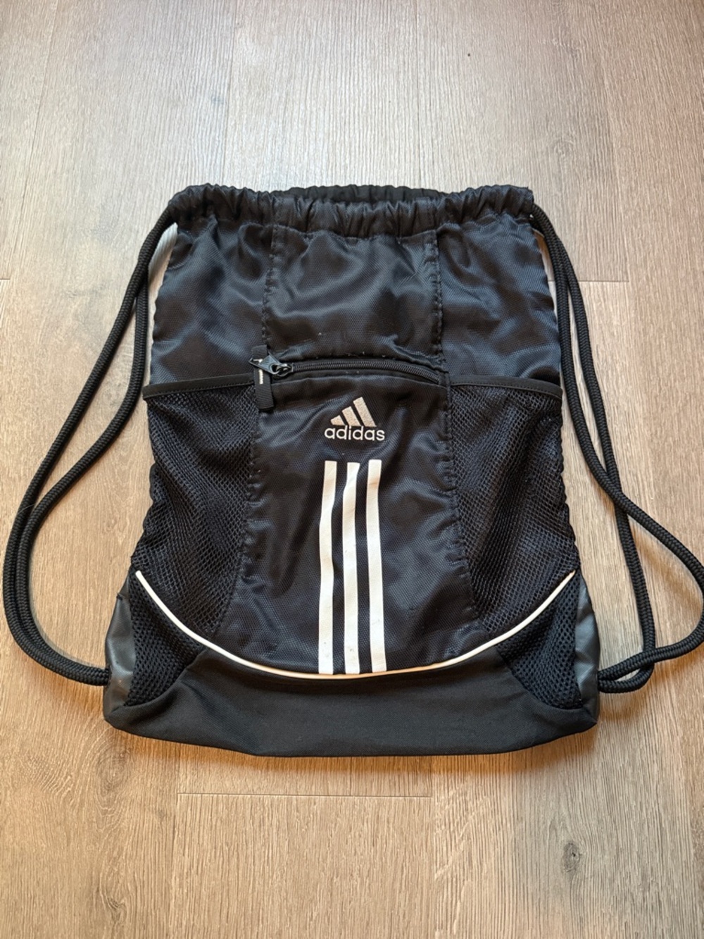 adidas Black and White Drawstring Backpack with Three-Stripe Logo